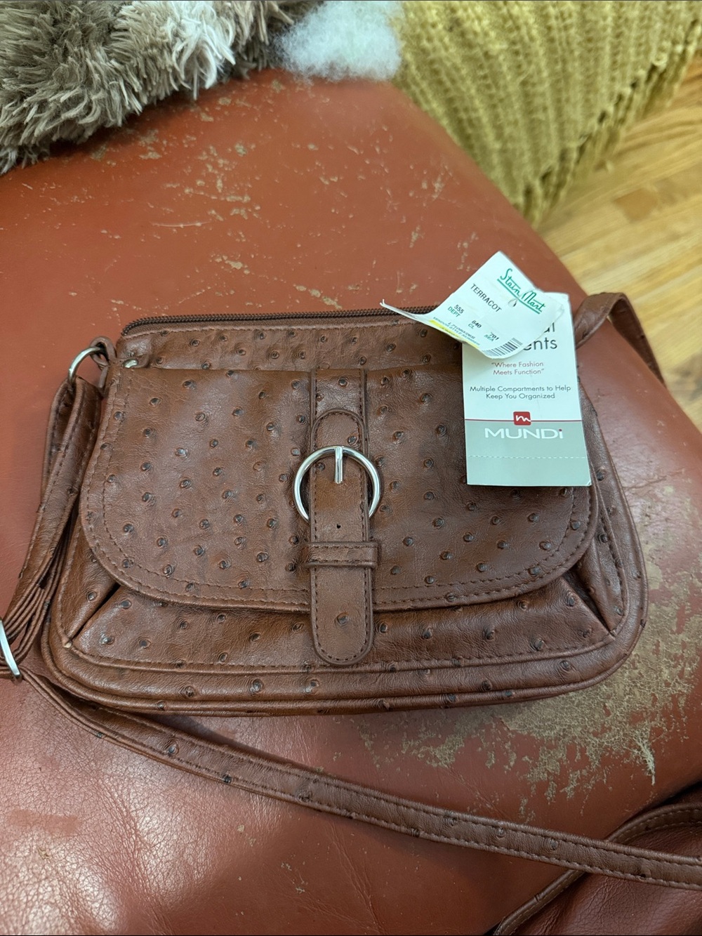 Mundi Brown Textured Crossbody with Buckle Accent
